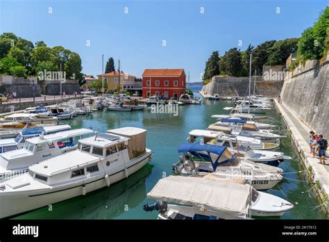 Boats moored outside the Land Gate, the historic entrance to the city ...