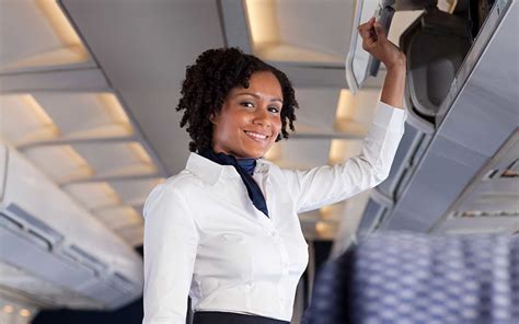 Your Flight Attendant Probably Likes You Better Than the First Class Passengers | Travel + Leisure