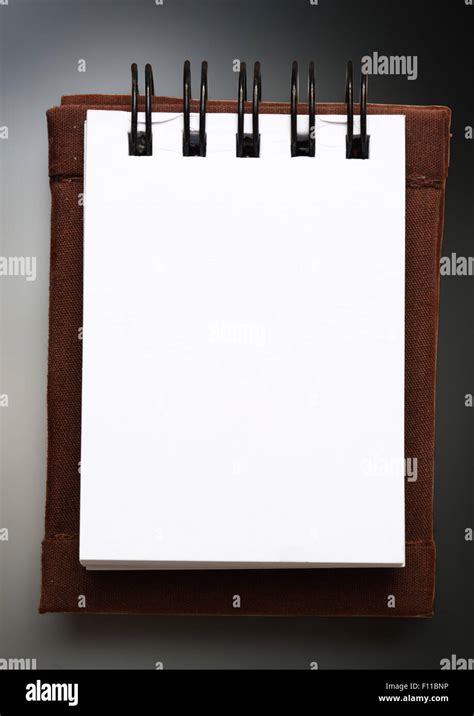 Blank white notepad as background in closeup Stock Photo - Alamy