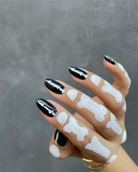 Black Halloween Nails: Ghosts, Bones, & 18 More Spooky Design Ideas