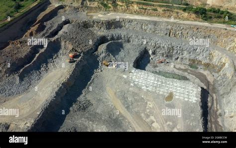 Quarry for the extraction of granite. Granite quarry Stock Photo - Alamy