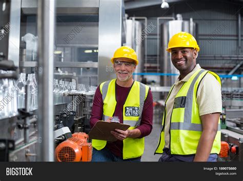 Two Factory Workers Image & Photo (Free Trial) | Bigstock