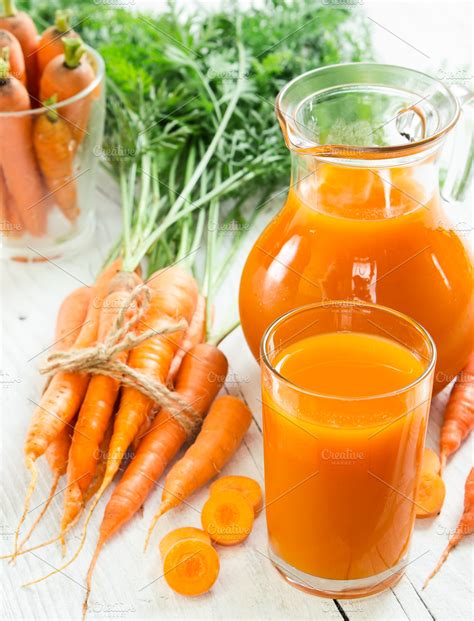 Carrot juice ~ Food & Drink Photos ~ Creative Market