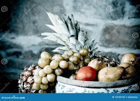 Basket full of fruits stock photo. Image of pineapple - 12543102