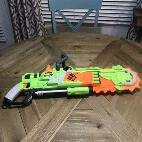 Nerf ZOMBIE Strike BRAINSAW Chainsaw Pump Action Blaster Gun Tested! | #3941339555