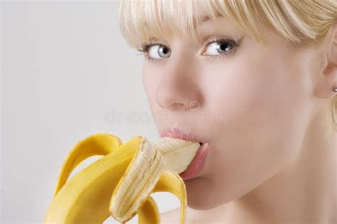 Woman eating banana stock image. Image of cheerful, beautiful - 12609173