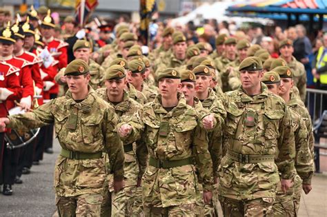 Soldiers from the 1st Battalion the Duke of Lancaster's Regiment march ...