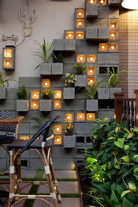 A Concrete Block Planter Wall Was Used To Add Greenery To This ...