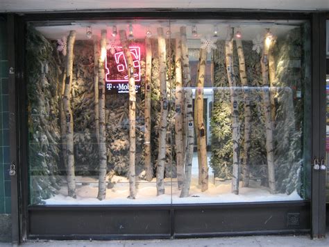 Phone store holiday window | Winter window display, Winter window, Holiday window display