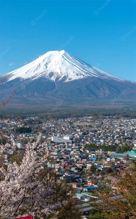 Premium Photo | Snow covered mount fuji mt fuji with clear dark blue ...