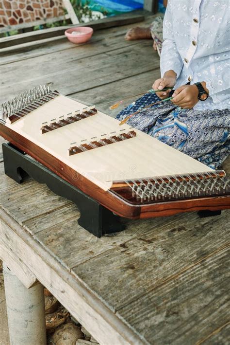 Thai Girl Playing Khim, the Traditional Thai Music Instrument. Leisure and Hobby Stock Image ...