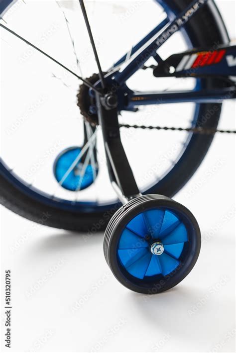 training wheels of kids bike with, close-up view Stock Photo | Adobe Stock