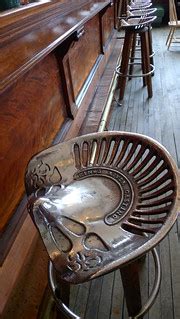 Comfy cast iron tractor seat stools | Thirteen Of Clubs | Flickr