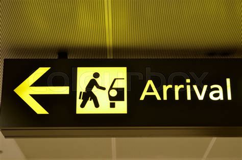 Airport arrival sign hanging from ... | Stock image | Colourbox