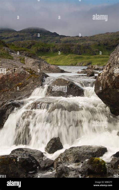 Waterfall above Finger Bay, Adak Island, Aleutian Islands, Alaska Stock Photo - Alamy