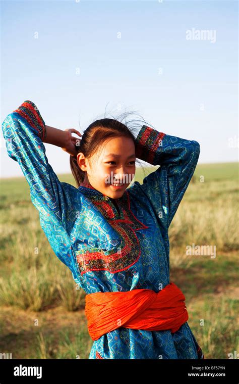 Mongolian woman in traditional costume, Hulun Buir Grassland, Manzhouli, Hulunbuir City, Inner ...