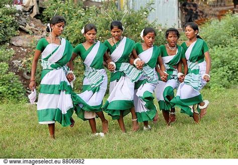 Tribal girls performing a typical tribal dance in traditional outfits. Oraon tribe. Hurhuru area ...