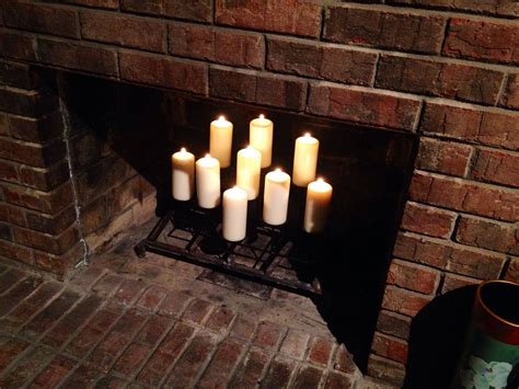 Candles in fireplace! | Candles in fireplace, Candles, Candle sconces