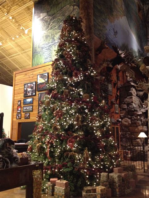 a decorated christmas tree in the middle of a room