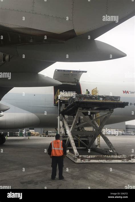 Boeing 747 cargo loading hi-res stock photography and images - Alamy