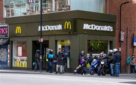 Huge queues outside London McDonald's as restaurant reopens for ...