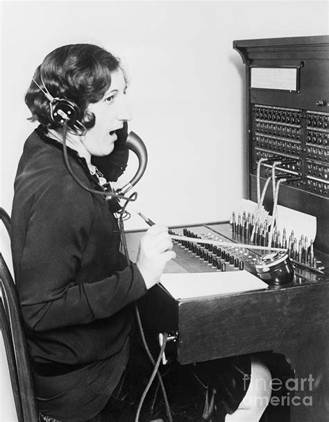 Telephone Operator At Switchboard by Bettmann