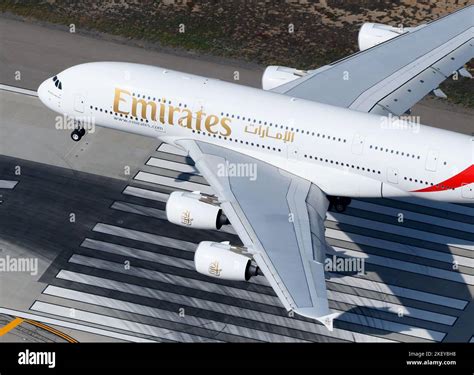 Emirates Airline Airbus A380 aircraft landing. Aerial view of Emirates Airlines A380-800 ...