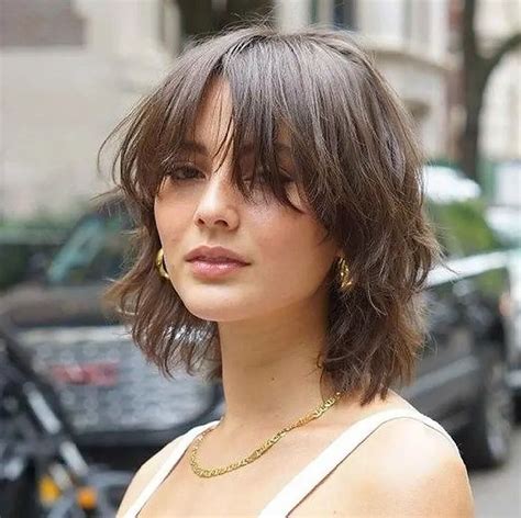 Layered Wolf Cut With Bangs: Say Hello to a Trendy Haircut!