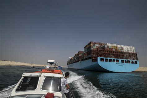 Suez Canal Blocked As Dust Storm Causes Container Ship To Run Aground | iHeart