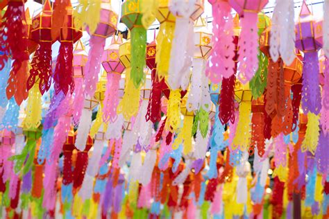 Colorful Lanna paper lanterns hang in Lamphun temples. Popular lantern festival during Loy ...