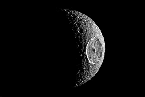 An Ocean May Lurk Inside Saturn’s ‘Death Star’ Moon - The New York Times