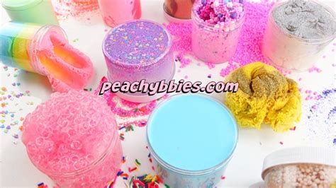 there are many different colored powders on the table with sprinkles around them