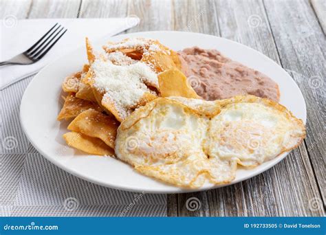 Eggs and chilaquiles stock image. Image of drink, kitchen - 192733505