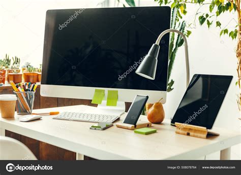 Office or home workspace. Computer monitor with black screen on office table with supplies Stock ...