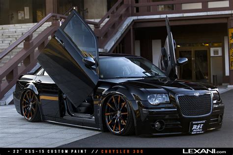 Dark Knight Chrysler 300 on Color Matched Lexani Rims — CARiD.com Gallery