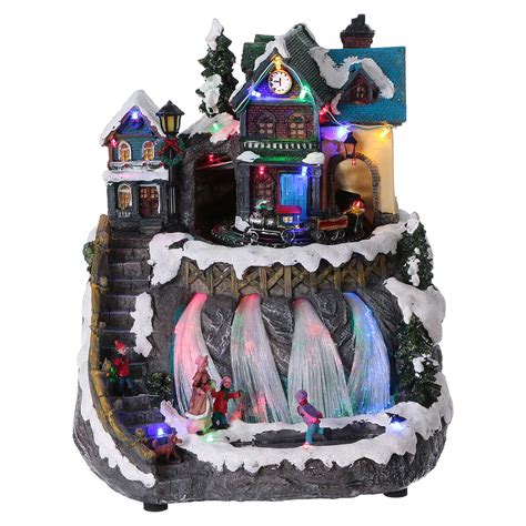 Animated musical Christmas village with train and frozen | online sales ...