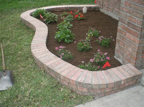 brick border in front of house - Google Search | Brick garden, Brick flower bed, Front yard ...