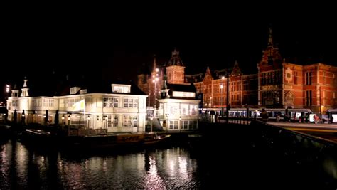 City Scenic With The Central Station In Amsterdam The Netherlands At Night Stock Footage Video ...