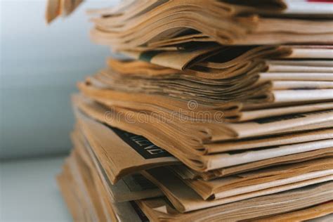 Stack of old newspapers stock image. Image of brown - 195238707