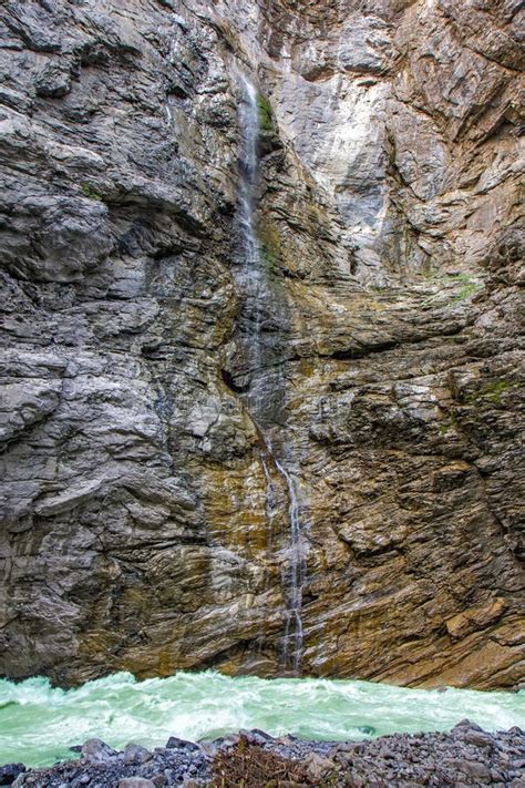 Waterfall in the Glacier Canyon in Grindelwald, Swiss Stock Photo ...