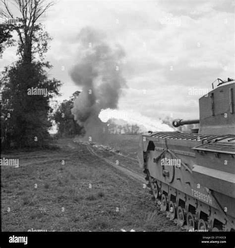 The British Army in France 1944 A Churchill Crocodile flame-throwing tank in action during a ...