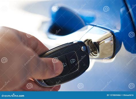 Unlocking car door stock photo. Image of luxury, owner - 131869466