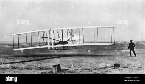 Kitty Hawk, North Carolina: December 17, 1903 Orville Wright flying ...