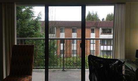 How should I adjust warped balcony door frame? - Home Improvement Stack Exchange