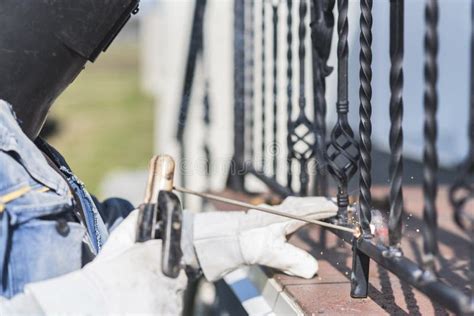 A Worker Welding Metal Handrails on the Stairs. Ukraine. Stock Image - Image of manufacturing ...