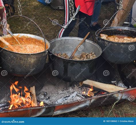 Very Large Cauldron Cooking Food during Campfire. Cooking in a Pot on ...