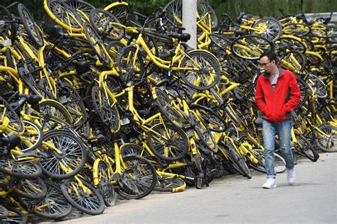 The Bike-Share Oversupply in China: Huge Piles of Abandoned and Broken ...