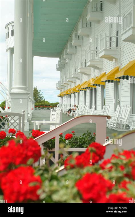 USA Michigan MI Mackinac Island Grand Hotel front porch with rockers and geraniums rocking ...