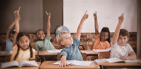 Cute pupils raising their hands - CanFASD