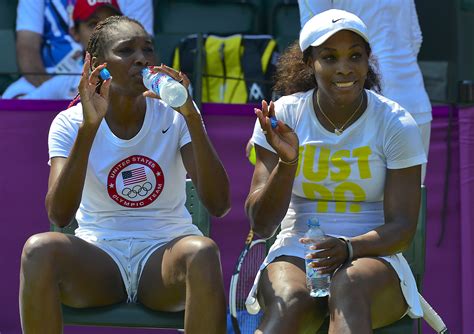 Venus and Serena Williams advance at Olympics - CBS News